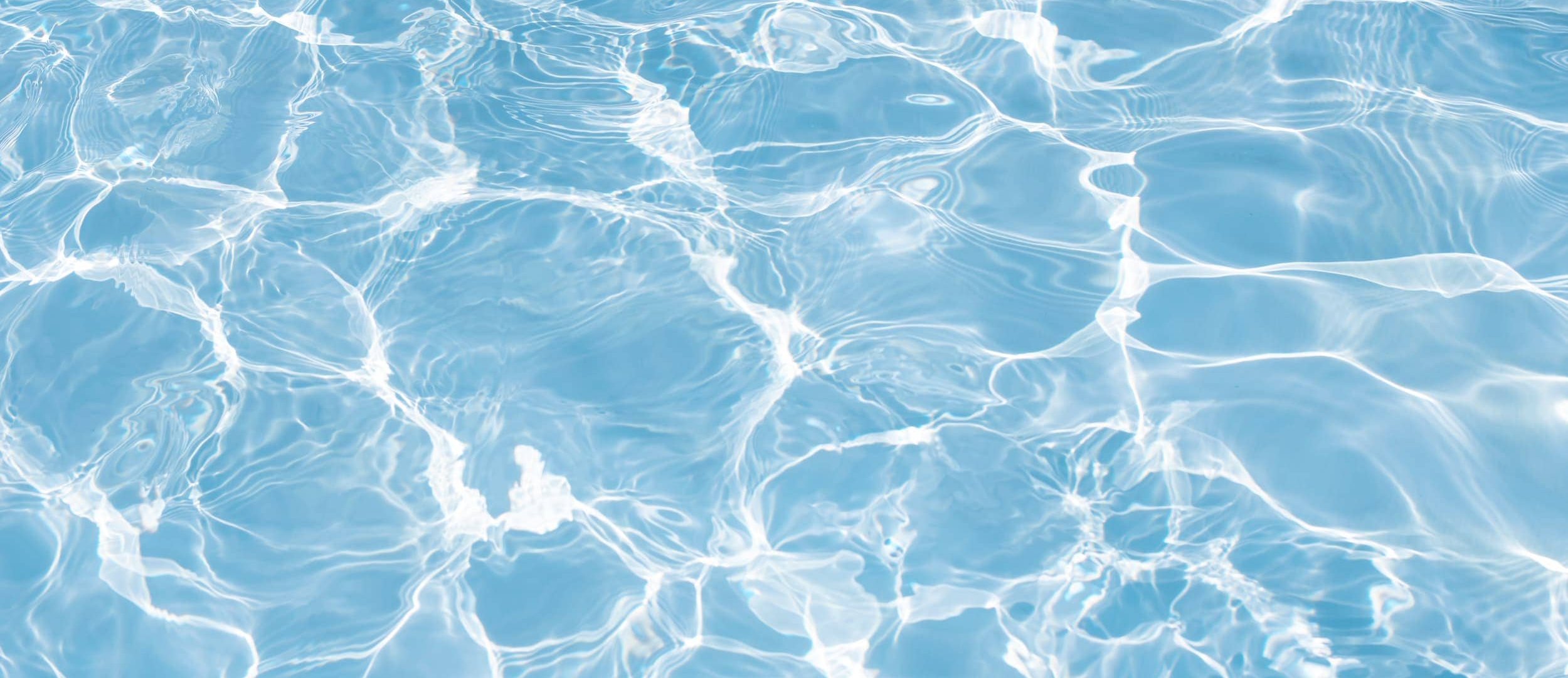 Clear swimming pool water surface